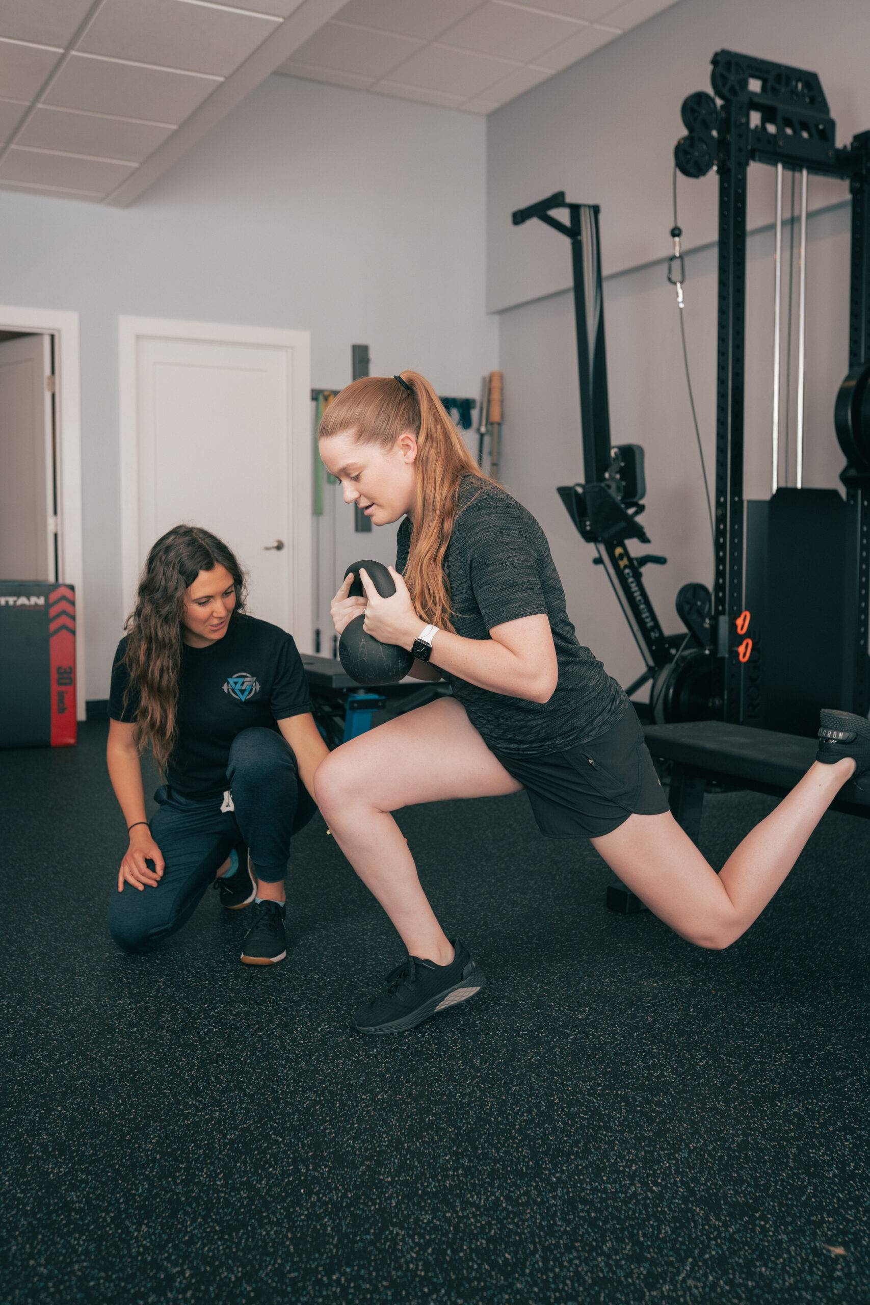 Patient working with a provider at a physical therapy clinic in Asheville, NC during a one-on-one manual therapy session